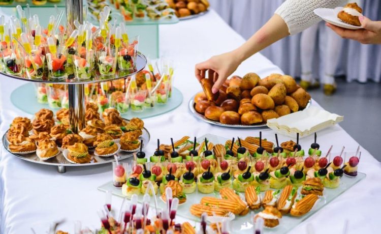 Finger food catering with a lady hand